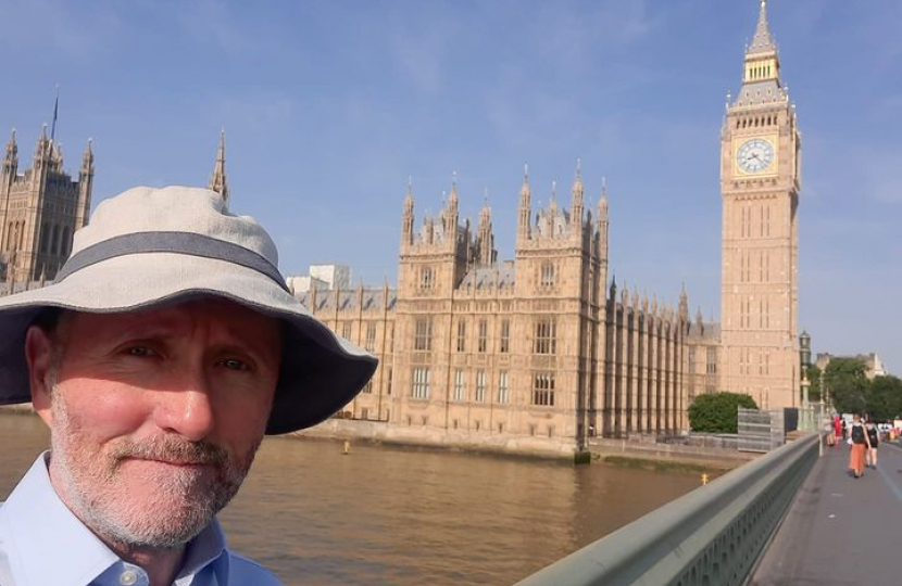 Eddie in Westminster wearing his hat in the heatwave